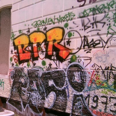 Graffiti and street art from a photo tour in Bremen including colourful sprayed tags and top-to-bottoms.
