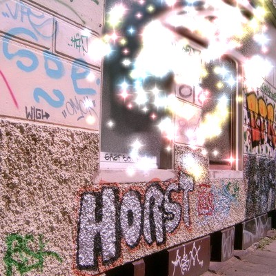 Graffiti and street art from a photo tour in Bremen including colourful sprayed tags and top-to-bottoms.
