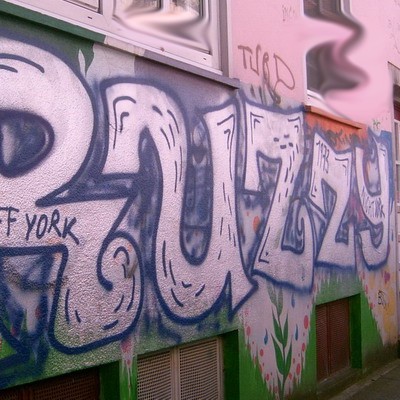Graffiti and street art from a photo tour in Bremen including colourful sprayed tags and top-to-bottoms.