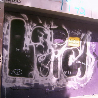 Graffiti and street art from a photo tour in Bremen including colourful sprayed tags and top-to-bottoms.