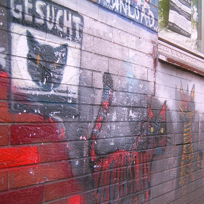 Graffiti and street art from a photo tour in Bremen including colourful sprayed tags and top-to-bottoms.
