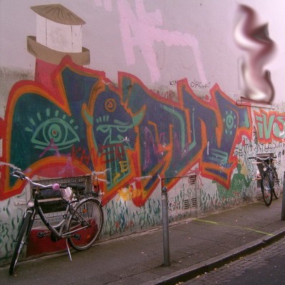 Graffiti and street art from a photo tour in Bremen including colourful sprayed tags and top-to-bottoms.