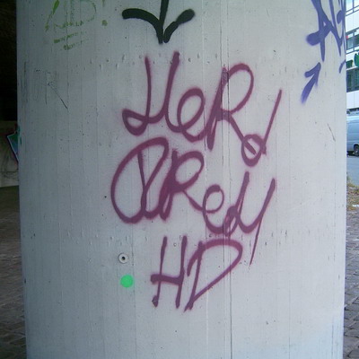 Graffiti and street art from a photo tour in Bremen including colourful sprayed tags and top-to-bottoms.