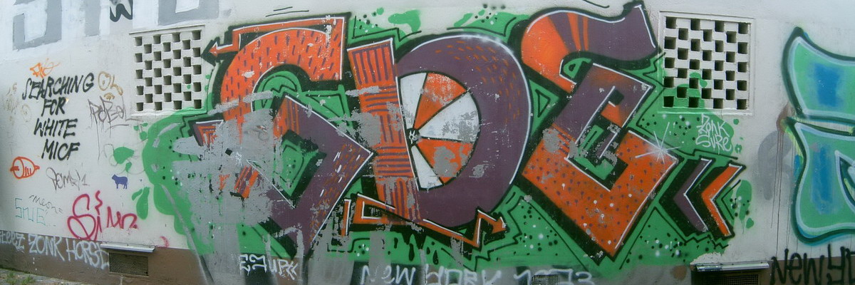 Graffiti and street art from a photo tour in Bremen including colourful sprayed tags and top-to-bottoms.