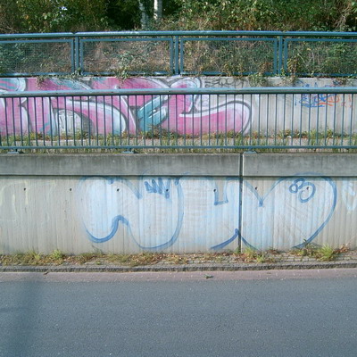 Graffiti and street art from a photo tour in Bremen including colourful sprayed tags and top-to-bottoms.
