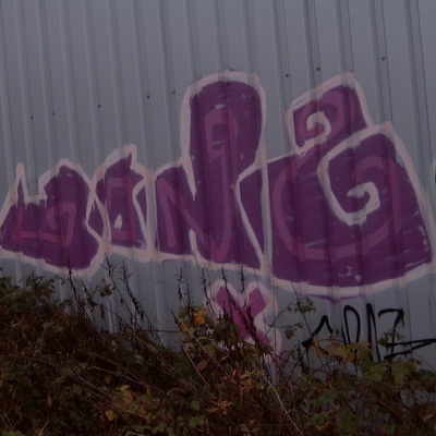 Graffiti and street art from a photo tour in Bremen including colourful sprayed tags and top-to-bottoms.