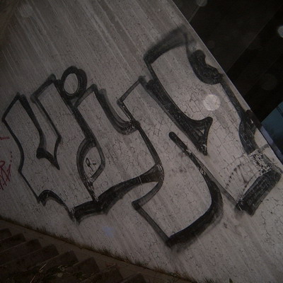 Graffiti and street art from a photo tour in Bremen including colourful sprayed tags and top-to-bottoms.