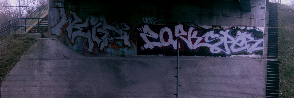 Graffiti and street art from a photo tour in Bremen including colourful sprayed tags and top-to-bottoms.