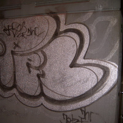 Graffiti and street art from a photo tour in Bremen including colourful sprayed tags and top-to-bottoms.