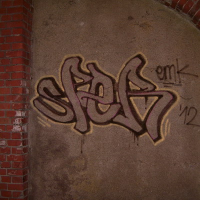 Graffiti and street art from a photo tour in Bremen including colourful sprayed tags and top-to-bottoms.