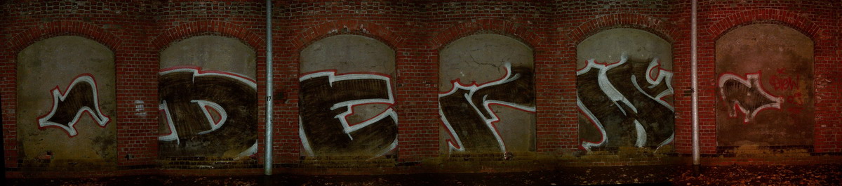 Graffiti and street art from a photo tour in Bremen including colourful sprayed tags and top-to-bottoms.