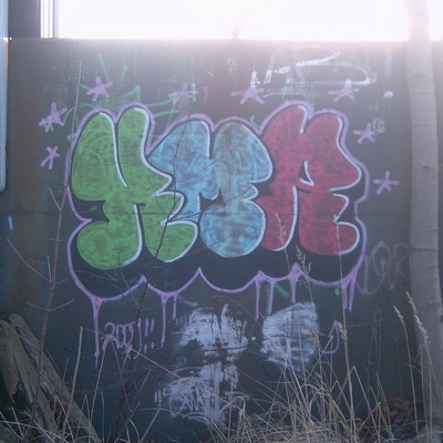 Graffiti and street art from a photo tour in Bremen including colourful sprayed tags and top-to-bottoms.