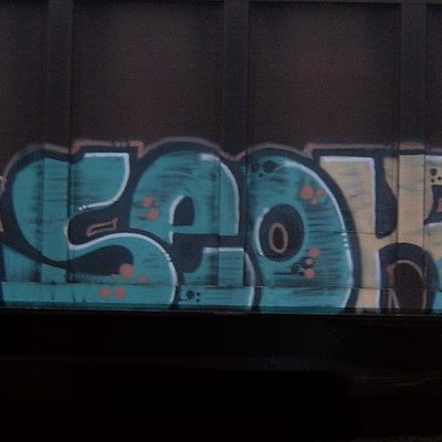 Graffiti and street art from a photo tour in Bremen including colourful sprayed tags and top-to-bottoms.