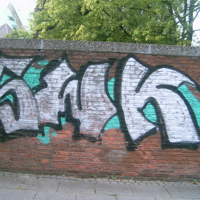 Graffiti and street art from a photo tour in Bremen including colourful sprayed tags and top-to-bottoms.