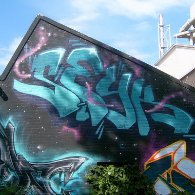 Graffiti and street art from a photo tour in Bremen including colourful sprayed tags and top-to-bottoms.