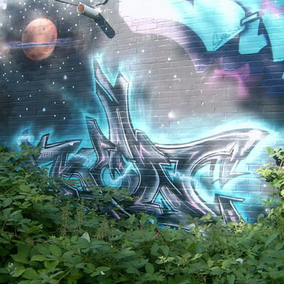 Graffiti and street art from a photo tour in Bremen including colourful sprayed tags and top-to-bottoms.