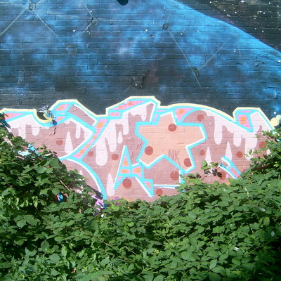 Graffiti and street art from a photo tour in Bremen including colourful sprayed tags and top-to-bottoms.