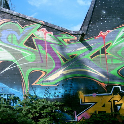 Graffiti and street art from a photo tour in Bremen including colourful sprayed tags and top-to-bottoms.