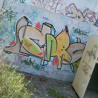 Graffiti and street art from a photo tour in Bremen including colourful sprayed tags and top-to-bottoms.