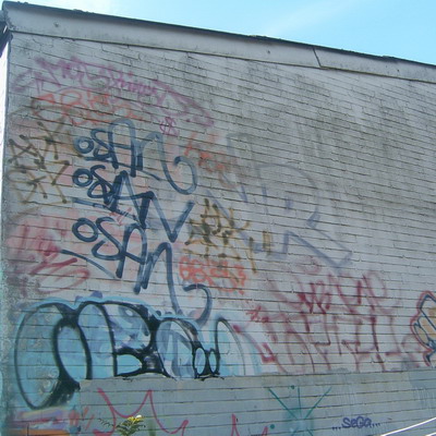 Graffiti and street art from a photo tour in Bremen including colourful sprayed tags and top-to-bottoms.