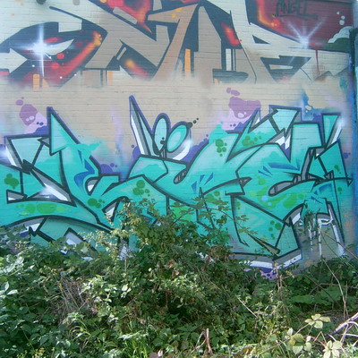 Graffiti and street art from a photo tour in Bremen including colourful sprayed tags and top-to-bottoms.