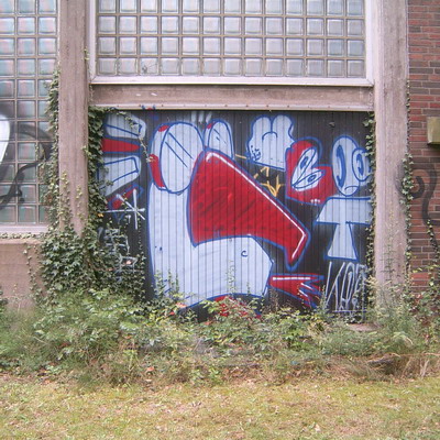 Graffiti and street art from a photo tour in Bremen including colourful sprayed tags and top-to-bottoms.
