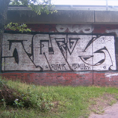 Graffiti and street art from a photo tour in Bremen including colourful sprayed tags and top-to-bottoms.