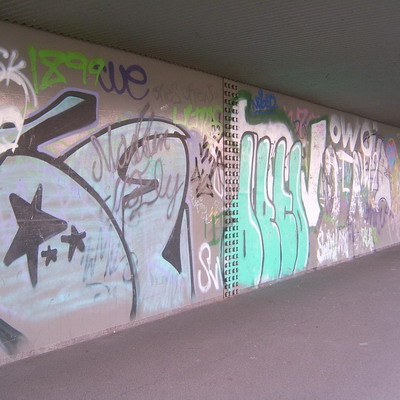 Graffiti and street art from a photo tour in Bremen including colourful sprayed tags and top-to-bottoms.