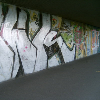 Graffiti and street art from a photo tour in Bremen including colourful sprayed tags and top-to-bottoms.