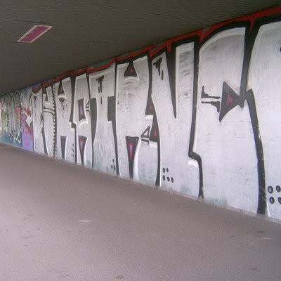 Graffiti and street art from a photo tour in Bremen including colourful sprayed tags and top-to-bottoms.