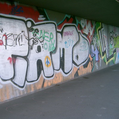 Graffiti and street art from a photo tour in Bremen including colourful sprayed tags and top-to-bottoms.