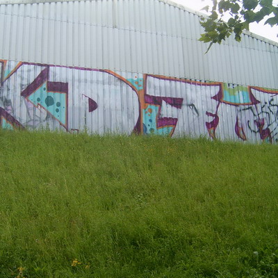 Graffiti and street art from a photo tour in Bremen including colourful sprayed tags and top-to-bottoms.
