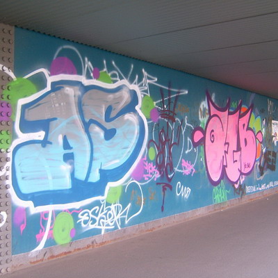 Graffiti and street art from a photo tour in Bremen including colourful sprayed tags and top-to-bottoms.