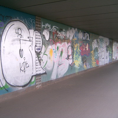 Graffiti and street art from a photo tour in Bremen including colourful sprayed tags and top-to-bottoms.