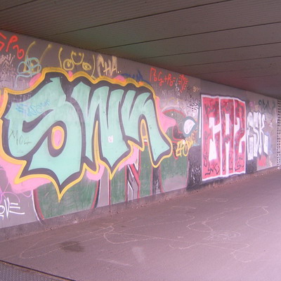 Graffiti and street art from a photo tour in Bremen including colourful sprayed tags and top-to-bottoms.