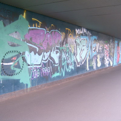 Graffiti and street art from a photo tour in Bremen including colourful sprayed tags and top-to-bottoms.