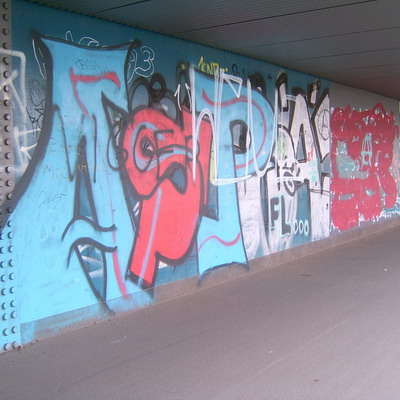 Graffiti and street art from a photo tour in Bremen including colourful sprayed tags and top-to-bottoms.