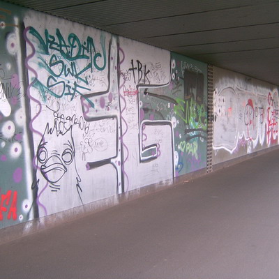 Graffiti and street art from a photo tour in Bremen including colourful sprayed tags and top-to-bottoms.
