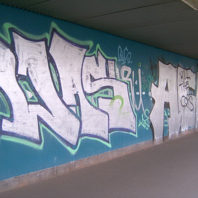 Graffiti and street art from a photo tour in Bremen including colourful sprayed tags and top-to-bottoms.
