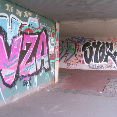 Graffiti and street art from a photo tour in Bremen including colourful sprayed tags and top-to-bottoms.