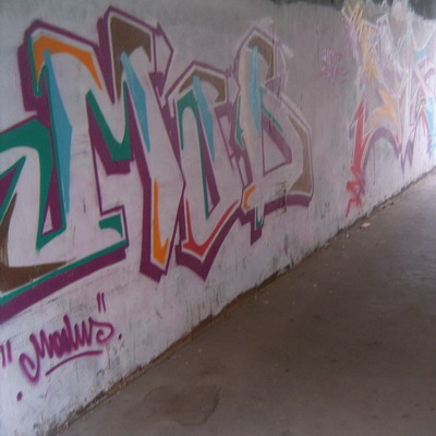 Graffiti and street art from a photo tour in Bremen including colourful sprayed tags and top-to-bottoms.
