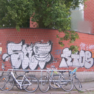 Graffiti and street art from a photo tour in Bremen including colourful sprayed tags and top-to-bottoms.