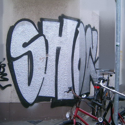 Graffiti and street art from a photo tour in Bremen including colourful sprayed tags and top-to-bottoms.