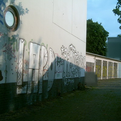Graffiti and street art from a photo tour in Bremen including colourful sprayed tags and top-to-bottoms.
