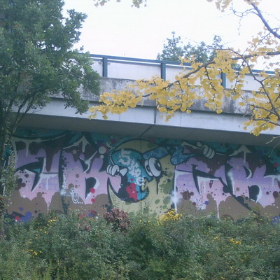 Graffiti and street art from a photo tour in Bremen including colourful sprayed tags and top-to-bottoms.