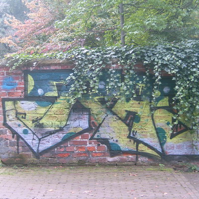 Graffiti and street art from a photo tour in Bremen including colourful sprayed tags and top-to-bottoms.
