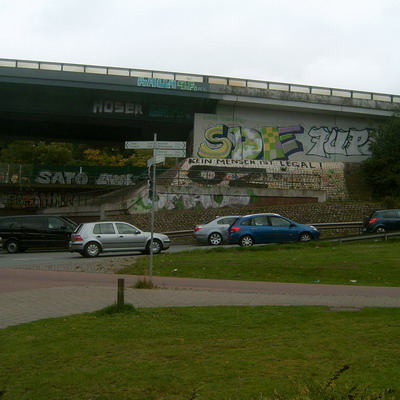 Graffiti and street art from a photo tour in Bremen including colourful sprayed tags and top-to-bottoms.