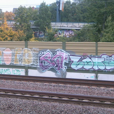 Graffiti and street art from a photo tour in Bremen including colourful sprayed tags and top-to-bottoms.