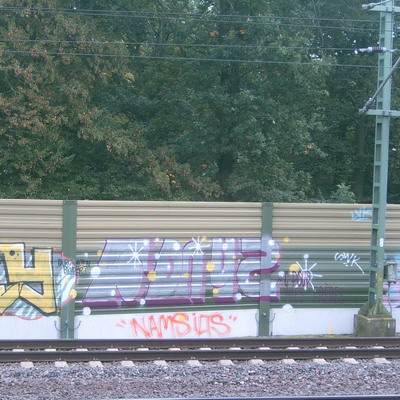Graffiti and street art from a photo tour in Bremen including colourful sprayed tags and top-to-bottoms.