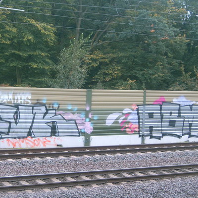 Graffiti and street art from a photo tour in Bremen including colourful sprayed tags and top-to-bottoms.